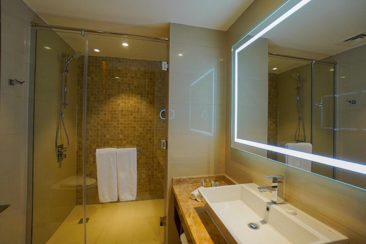 The Grand Lux Hotel Doha Exterior foto Bathroom