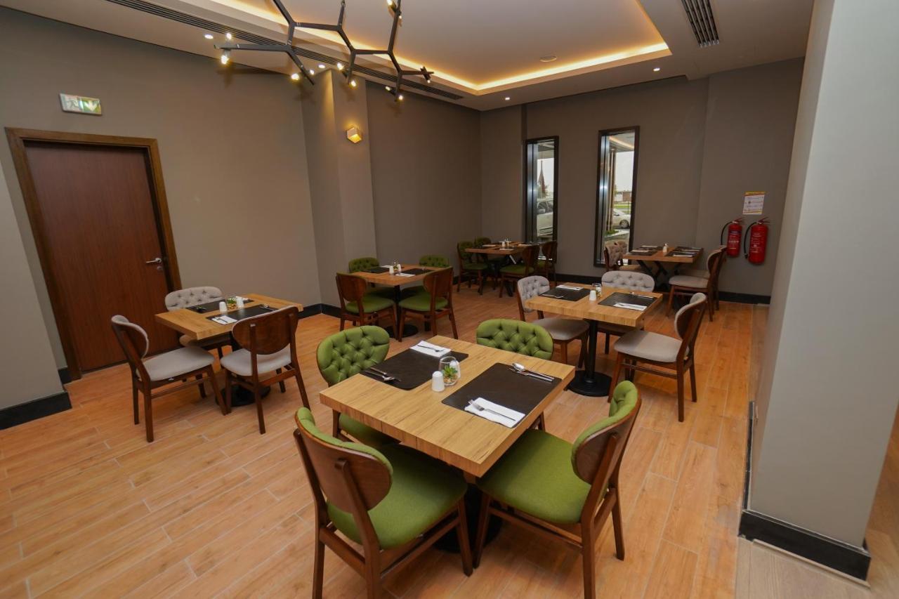 The Grand Lux Hotel Doha Exterior foto The restaurant