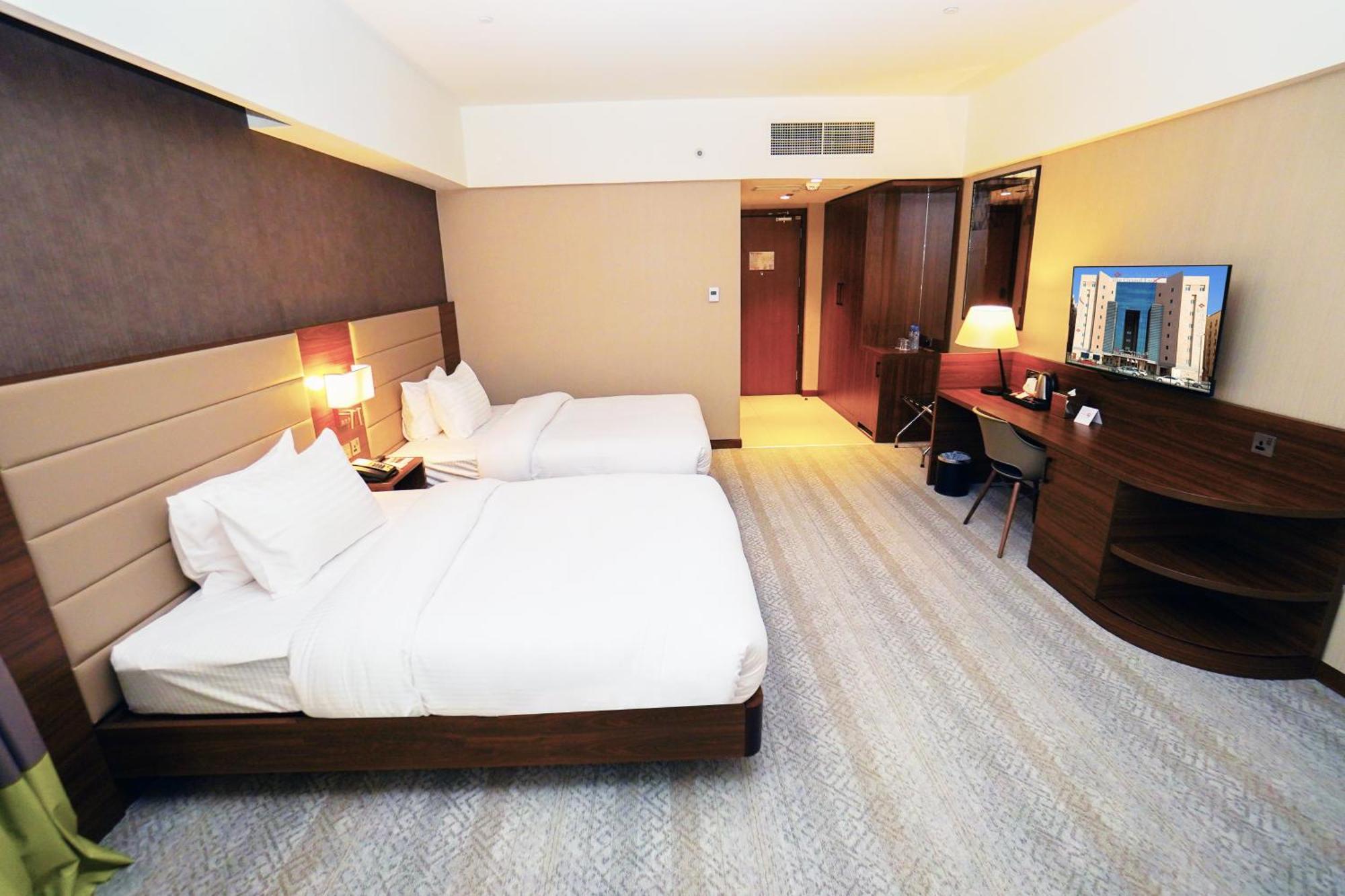 The Grand Lux Hotel Doha Exterior foto Deluxe Room